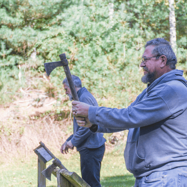 summer camp - axe thrown competition